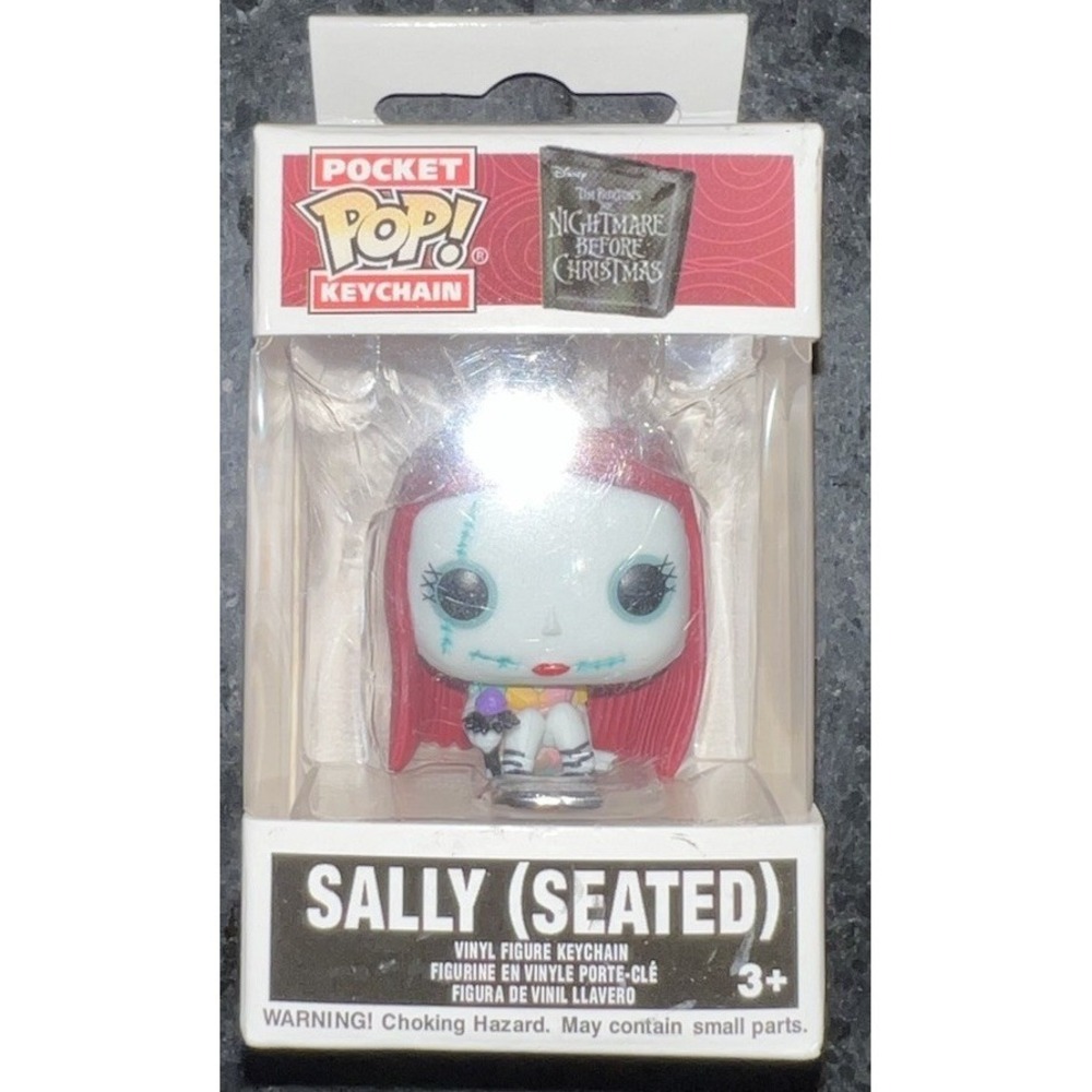 (J1/1.33)Funko Pop Pocket Sally Seated Disney The Nightmare Before Christmas NBC
